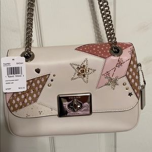 New Coach purse with tags attached
